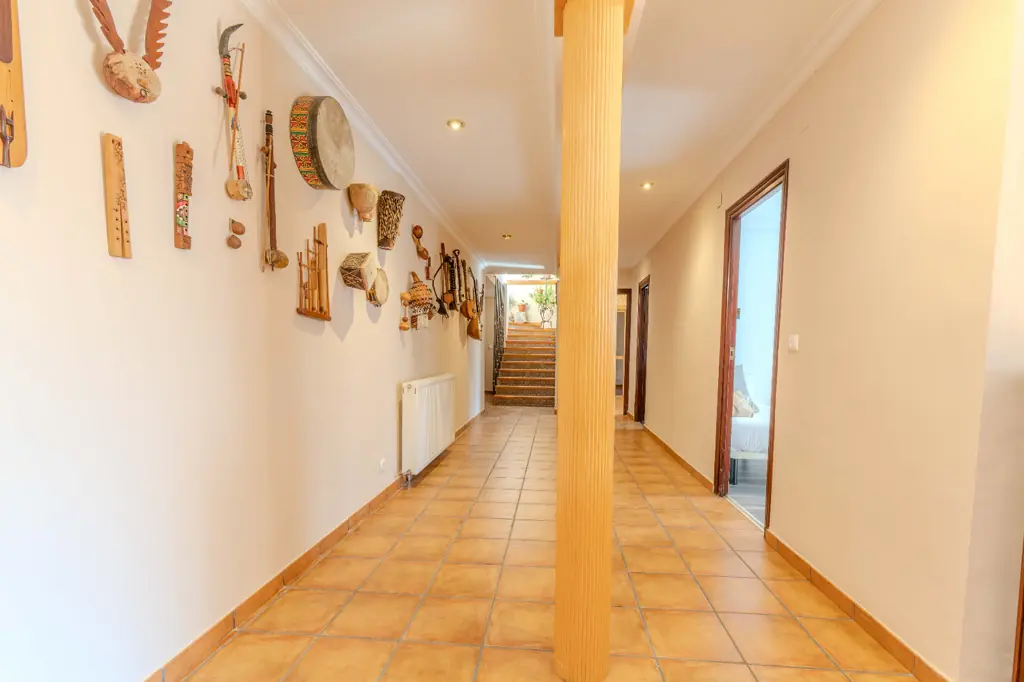 Spacious bedroom with a double bed at La Cova House