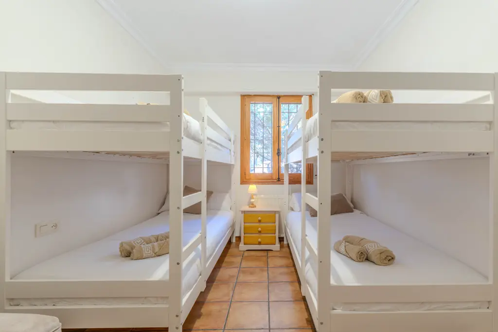 Spacious bedroom with a double bed at La Cova House
