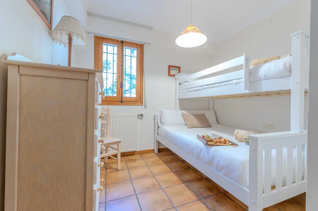 Spacious bedroom with a double bed at La Cova House