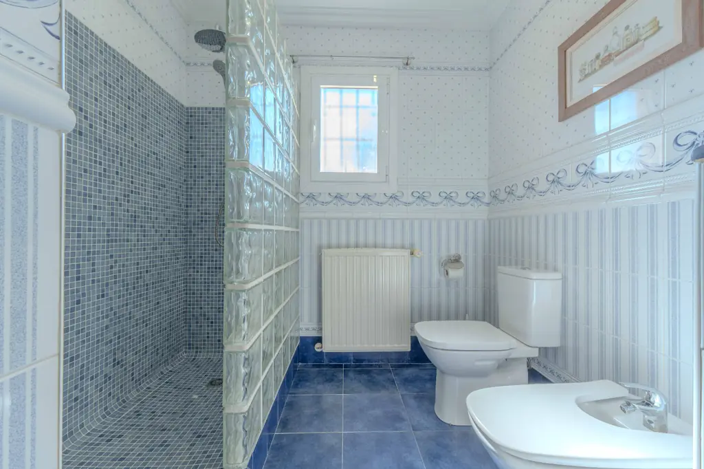 Spacious bedroom with a double bed at La Cova House