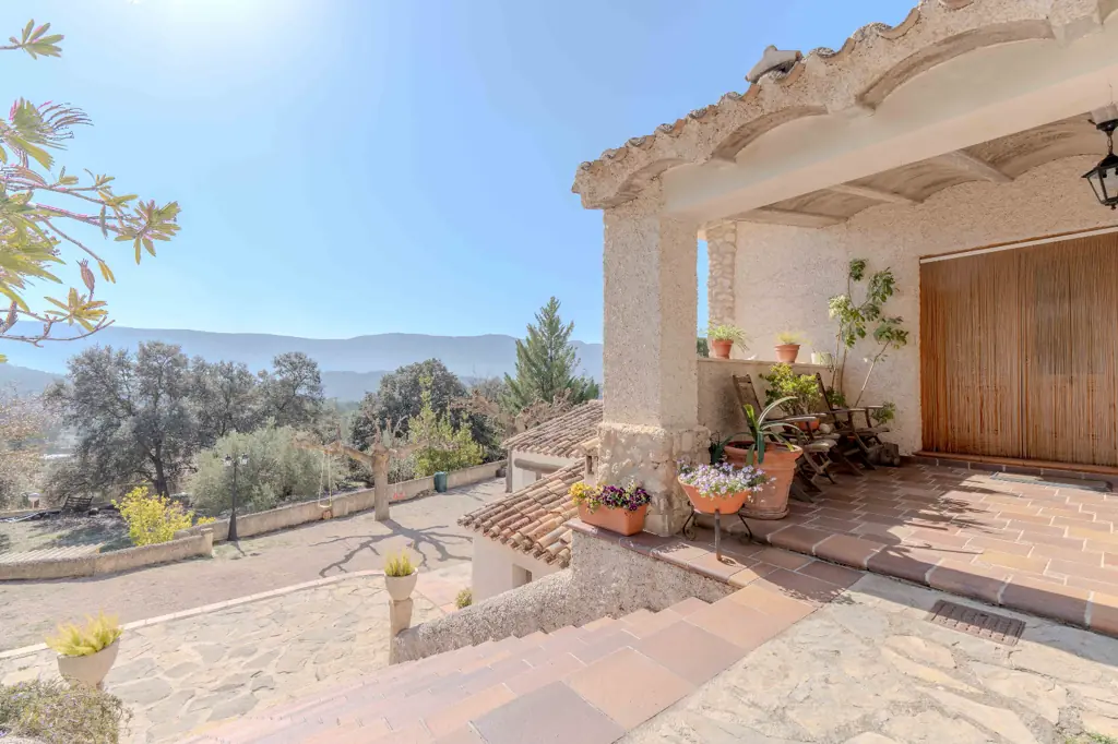 Spacious bedroom with a double bed at La Cova House